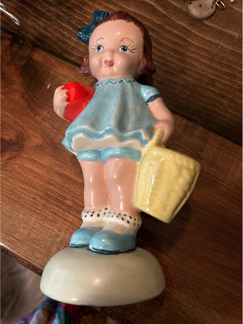 Vintage Ceramic Figurine of Girl with Basket and Red Apple